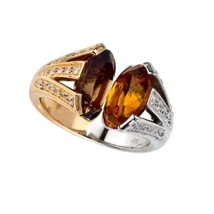 ring with large smokey topaz and large palmeira facing each other
