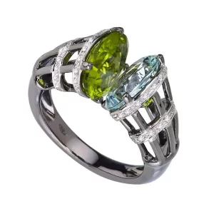 ring with large peridot and large white topaz facing each other