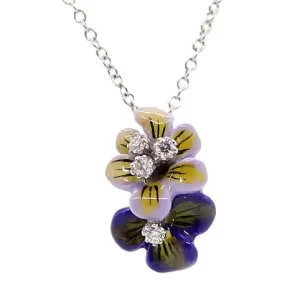 two vertically stacked purple enamel flowers with diamond center; top flower is light mauve; bottom flower is deep purple