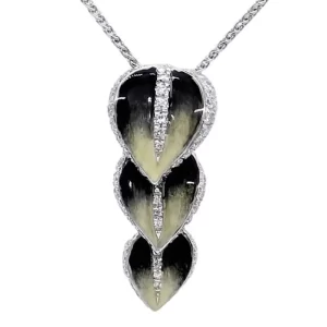 three dark green vertically stacked enamel leaves with round accent diamonds around the leaves and down their center