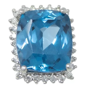 large london blue topaz surrounded by a halo of round diamonds