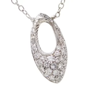 cluster of diamonds in an almond shape with an almond-shaped cutout offset near the top