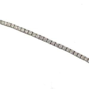 diamonds in a white gold flexible bangle bracelet