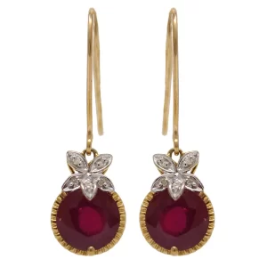 fishhook dangle earrings with a round ruby and accent diamonds at the top of the ruby
