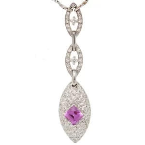 dangle necklace with three pointed oval segments of diamonds; bottom segment has square pink sapphire surrounded by a diamond cluster