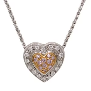 pink diamonds surrounded by white diamonds in a heart shape pendant