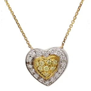 yellow diamonds surrounded by white diamonds in a heart shape and attached to a yellow gold chain