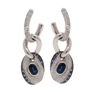 dangle earrings of oval sapphires accented with diamonds