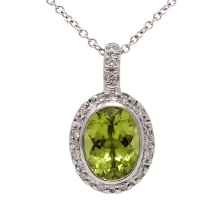 oval peridot with diamond halo and bail pendant