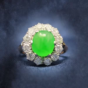 cabochon jadeite with a 12 diamond halo