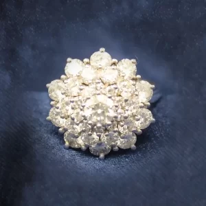 21 round diamonds in a small dome cocktail ring