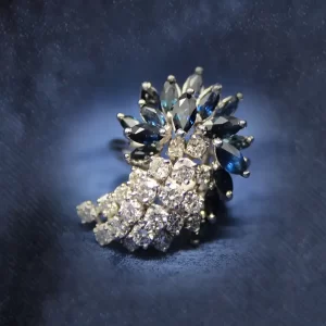 17 marquise sapphires in a fan shape with a cascade of 21 round diamonds under the sapphires