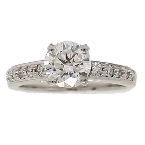 round center diamond with 5 accent diamonds are each side on the shank