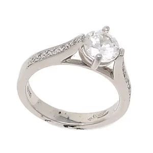 semi-mount cathedral setting with diamonds on the shoulders and shank; ready for a 1-carat round center stone