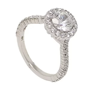 semi-mount with a halo of round diamonds and round diamonds accenting the shank; ready for a 1-carat round center stone