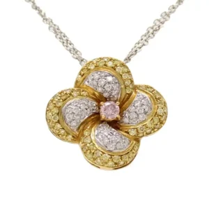 yellow gold flower pendant with 4 petals of round yellow and white diamonds and a center round pink diamond