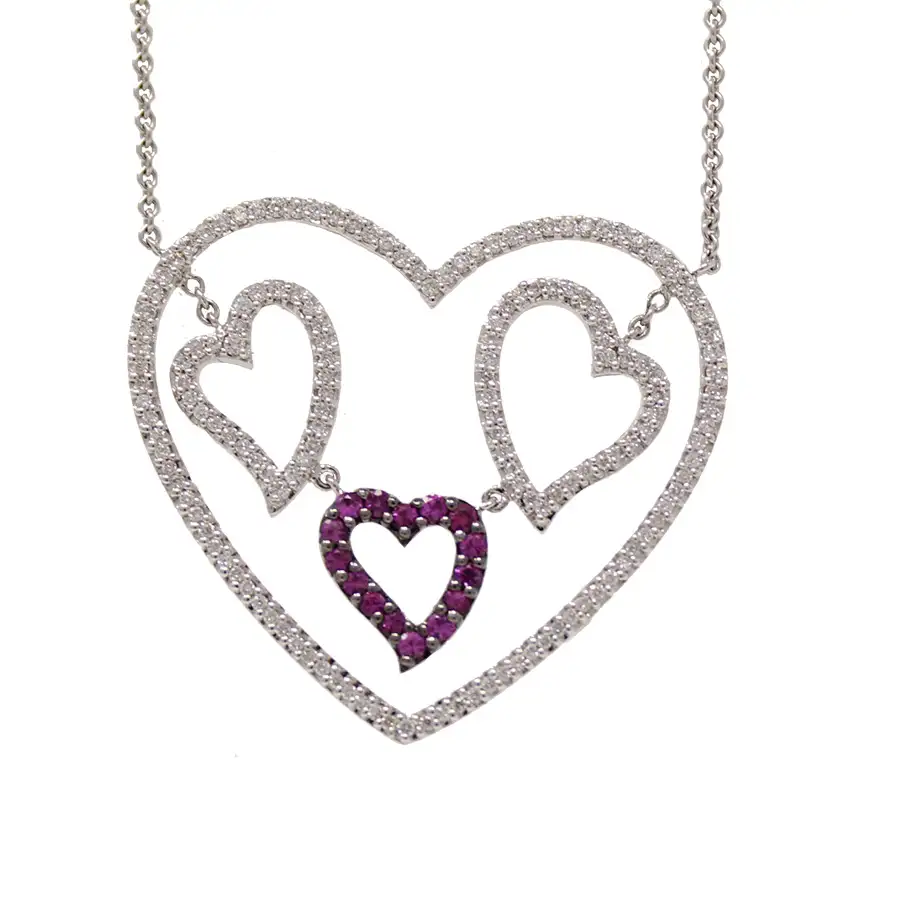 diamond symmetric heart surrounding 3 playful hearts. Outer and 2 inner hearts are outlines in white diamonds. One inner heart is outlined in pink diamonds.