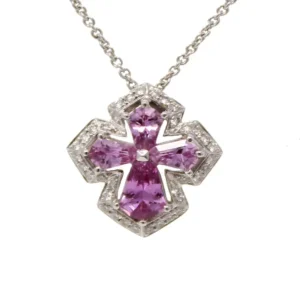 white gold cross pendant with 4 various shape pink sapphires outlined with 36 individually-set round diamonds