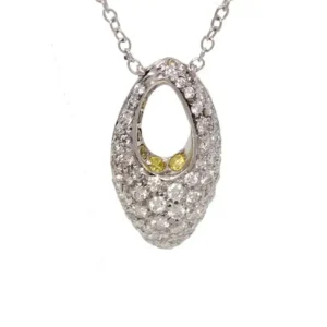 white diamond cluster almond-shape necklace with two yellow accent diamonds and an almond-shape cutout offset near the top.