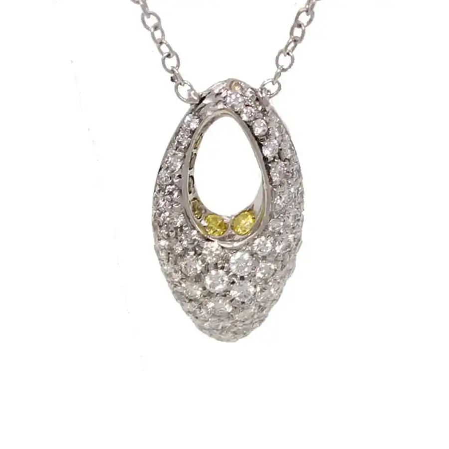 white diamond cluster almond-shape necklace with two yellow accent diamonds and an almond-shape cutout offset near the top.